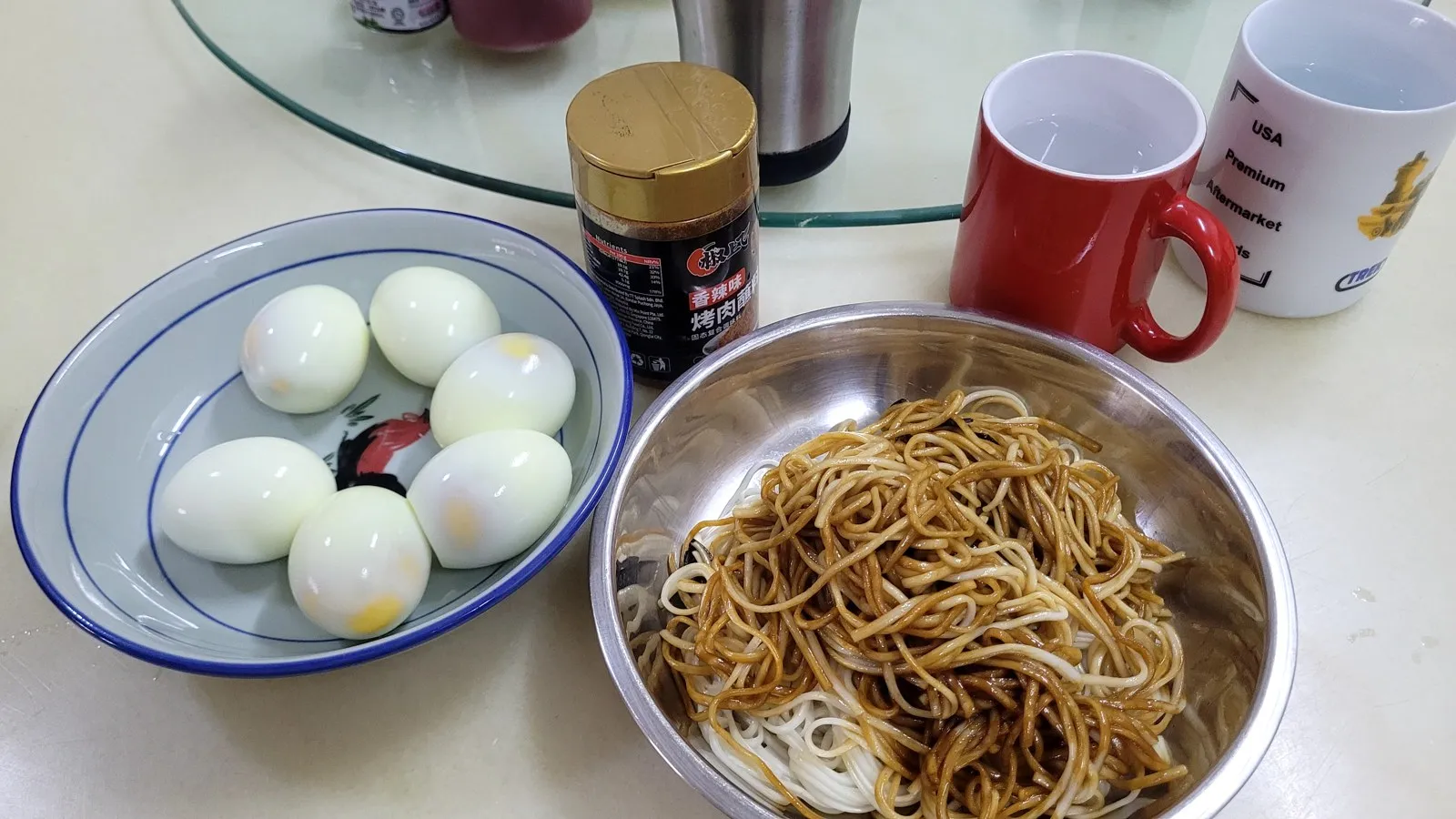 Boiled eggs and noodles on the breakfast table