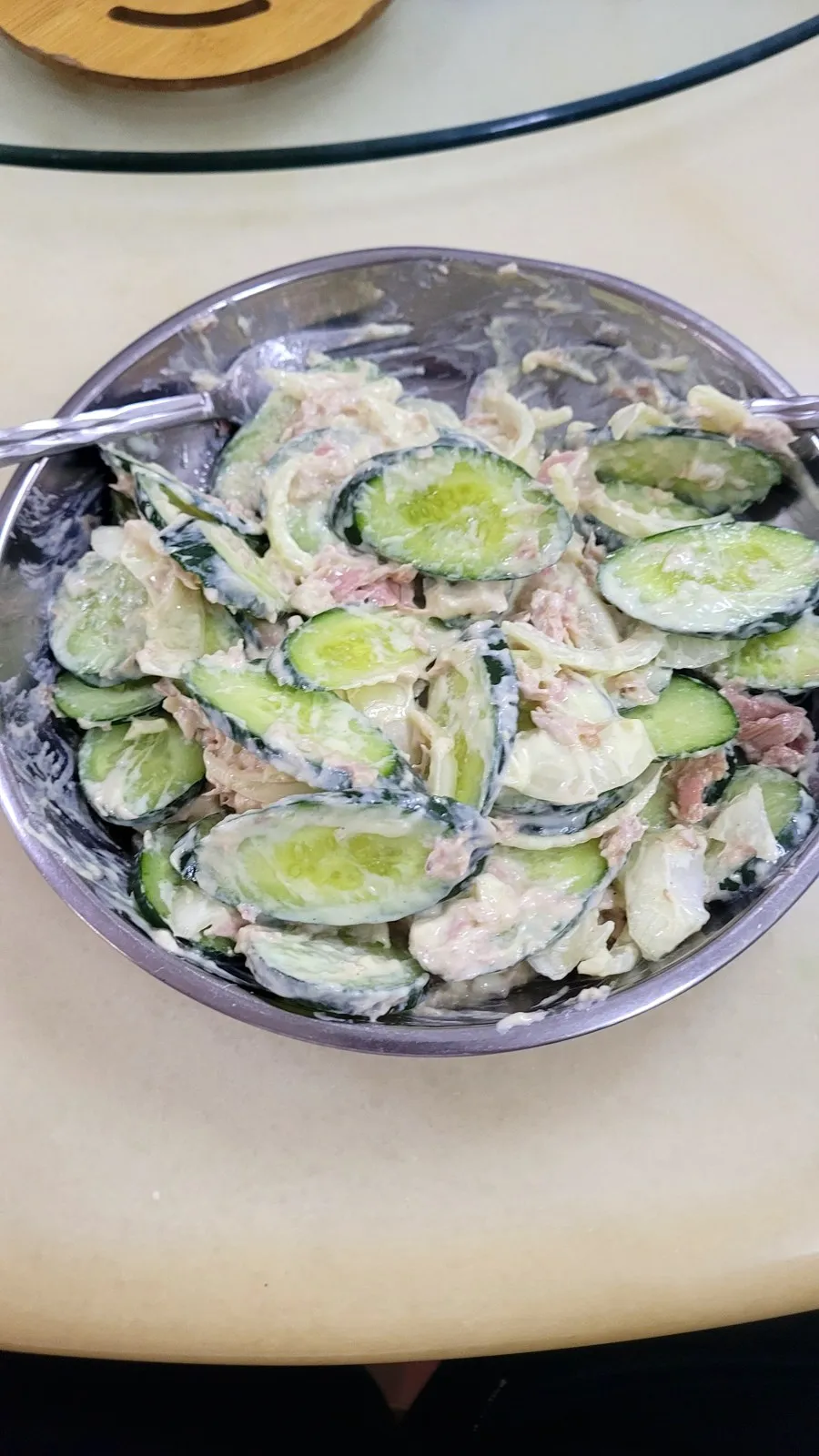 A bowl of tuna and cucumber salad