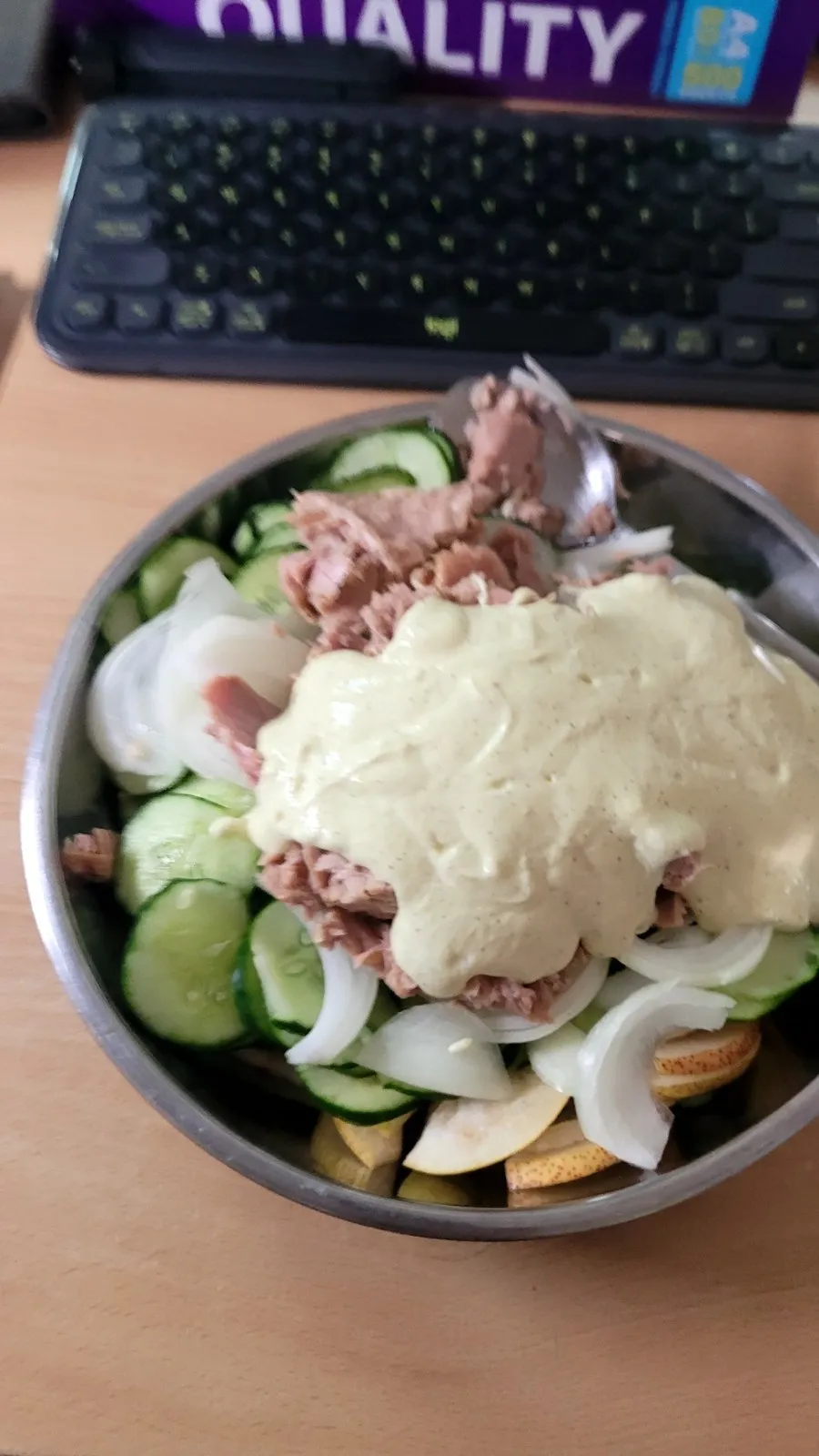 Tuna salad with cucumber, onion and dressing