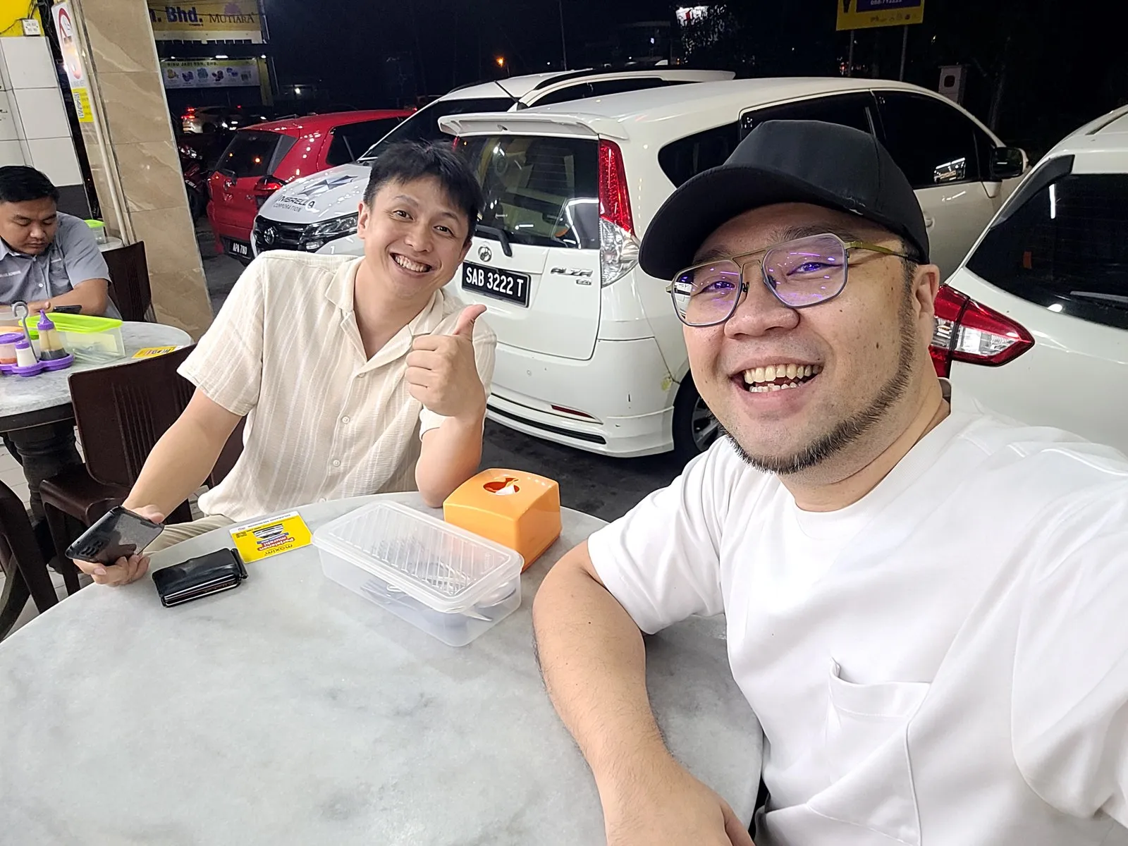 Selfie with a friend at an outdoor table