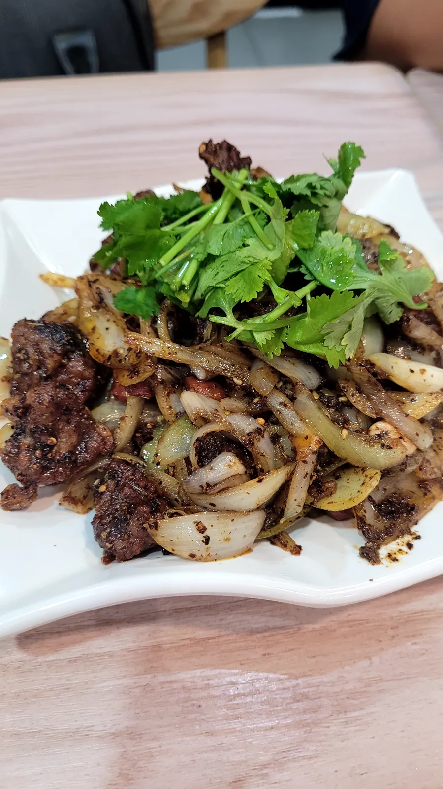 Cumin beef with onions and coriander