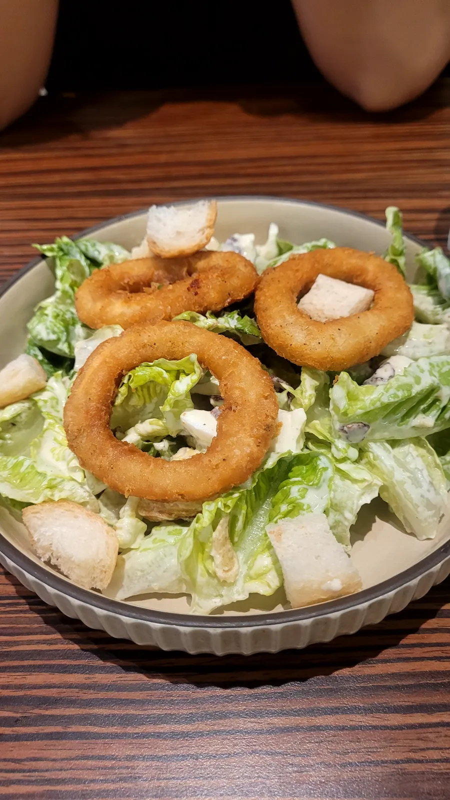 Caesar salad with calamari rings