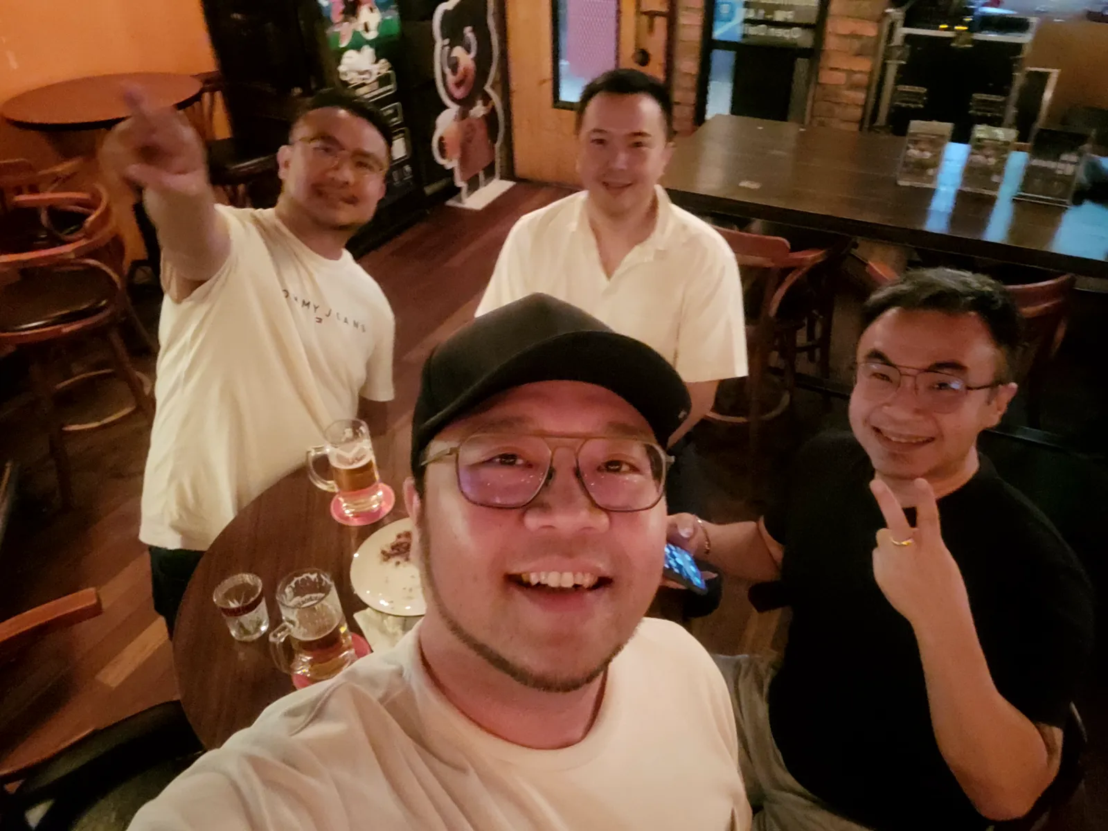 Group selfie with friends, later in the night