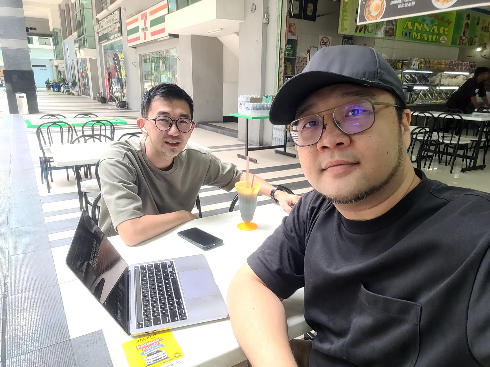 Selfie with a friend working at a cafe