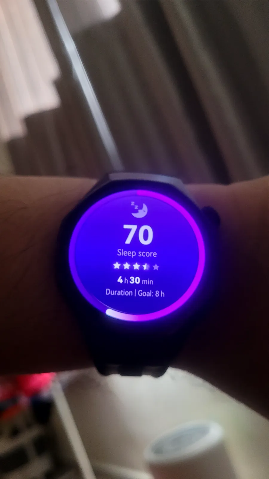 Watch showing sleep score 70, 4 hours 30 minutes